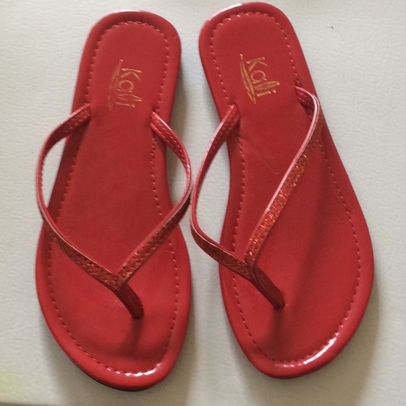 girls red flip flops